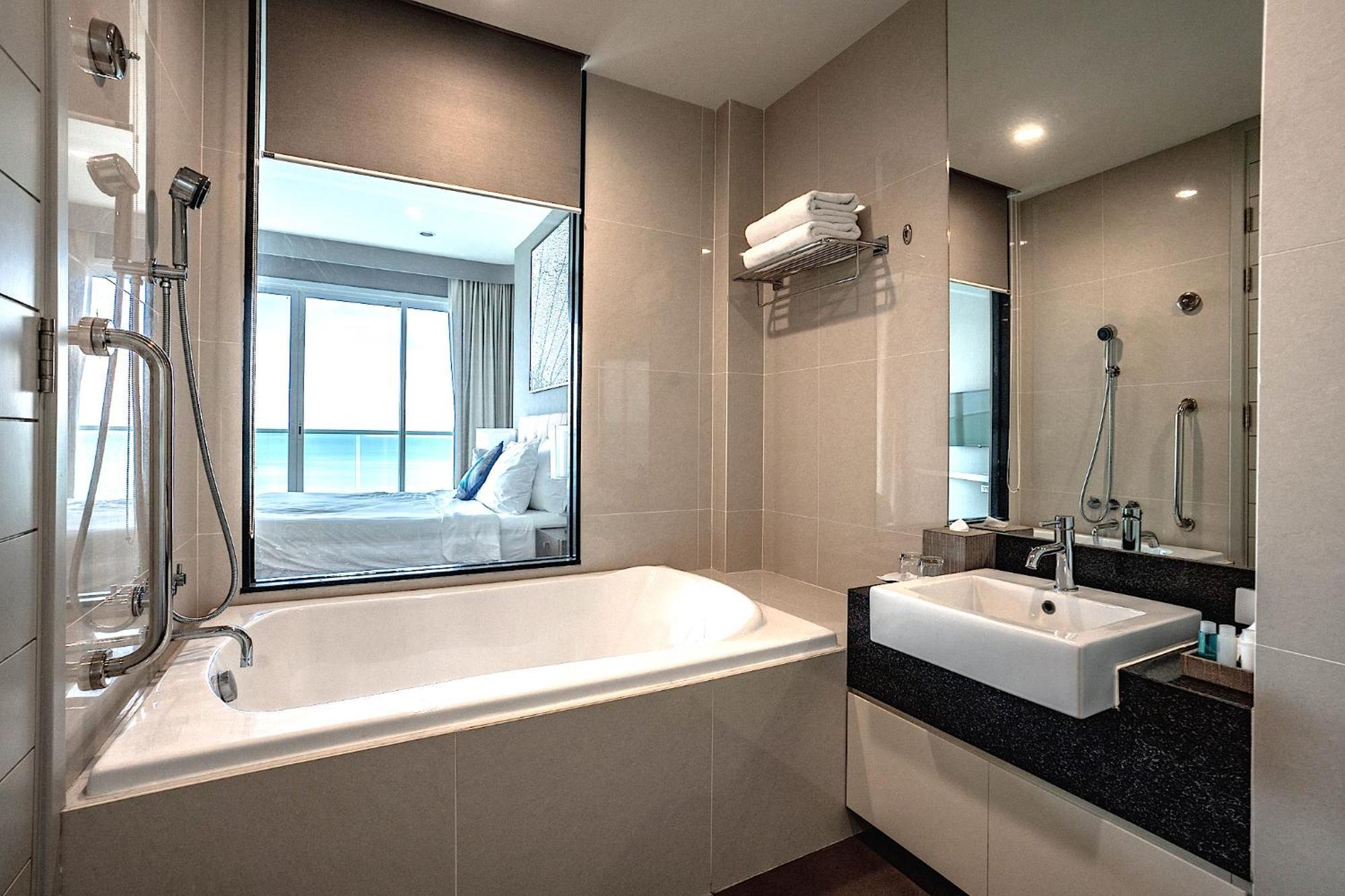 Movenpick Residences Pattaya With Ocean View На Джомтьен Экстерьер фото